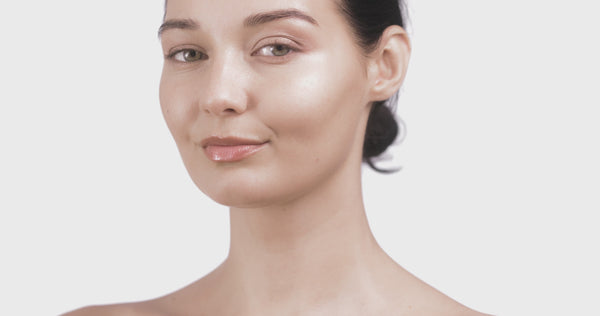Woman applying face cream for sensitive skin with multi-molecular hyaluronic acid – The North DNA clean skincare, deep hydration and barrier support